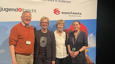 Rüdiger Grimm, Christine Regitz, Christel Baier und Sanaz Mostaghim vor der Pressewand des Wettbewerbs